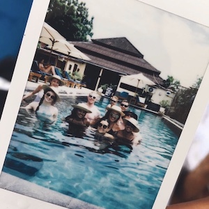 polaroid picture of friends in a pool in Bali